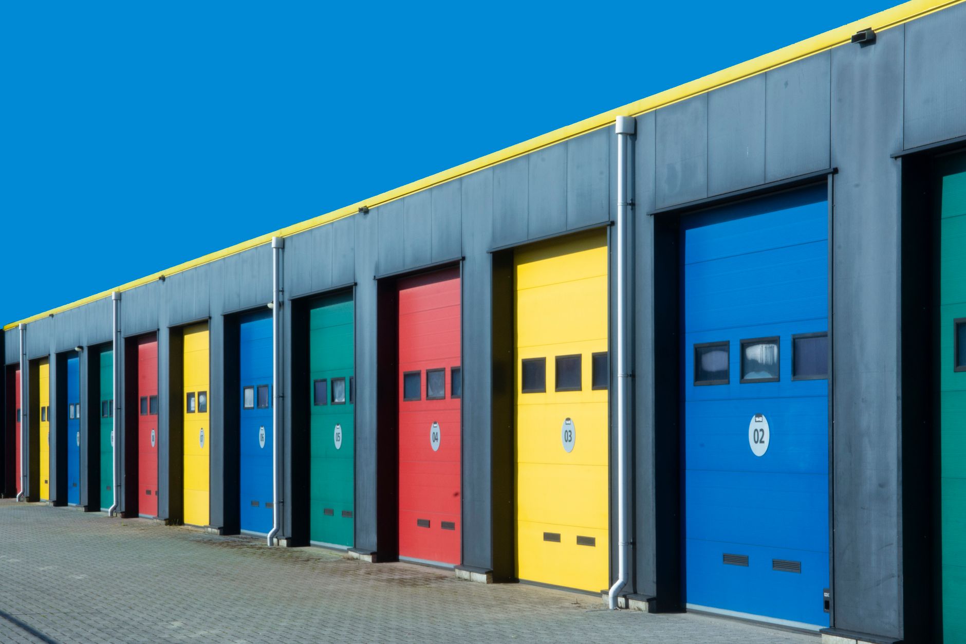 Exterior row of colorful storage-unit doors